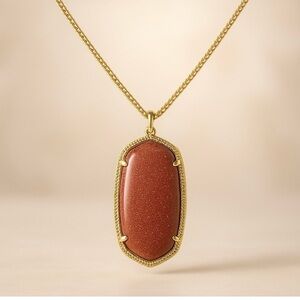 Kendra Scott Burnt Orange Necklace in Gold. Bag and box included. Longhorn color